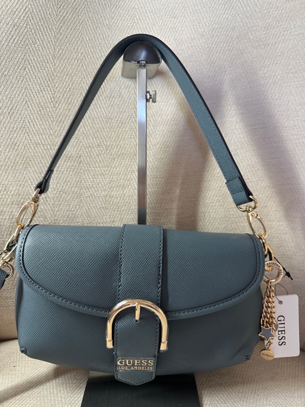 Guess Dark Denim Color Crossbody Saddle Bag with Gold Hardware - Picture 3 of 10